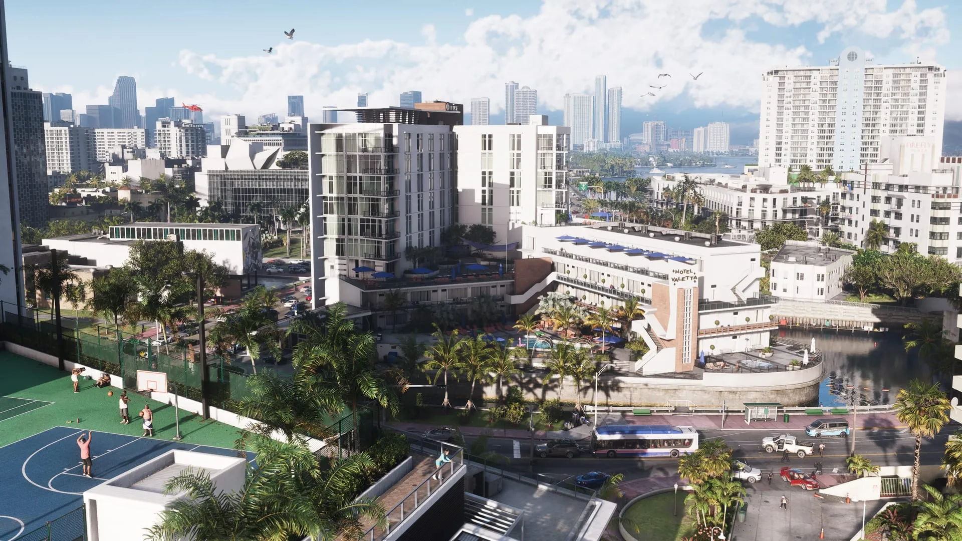 Vue aérienne d'un quartier de Vice City, entre gratte-ciel et terrains de sport